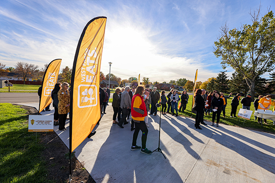 outdoor ribbon cutting event at West Fargo Eats location