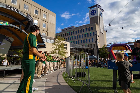 NDSU’s Gold Star Marching Band and Cheer Team perform at the Gate City Bank NDSU Homecoming party.