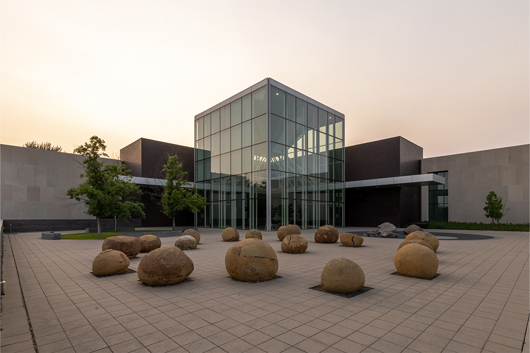 Exterior view of the North Dakota Heritage Center and State Museum at sunset in Bismarck, ND