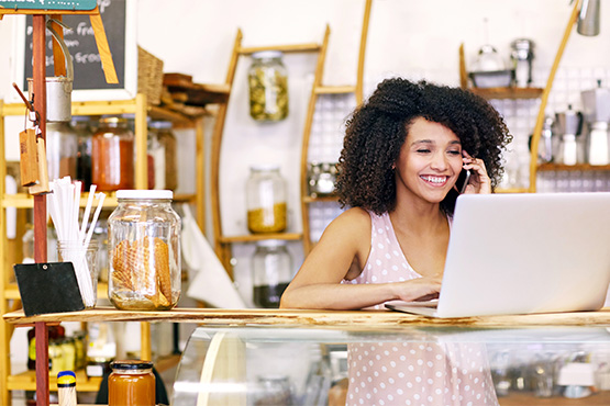 Business customer monitors profits and interest earnings on Gate City Bank business savings accounts.