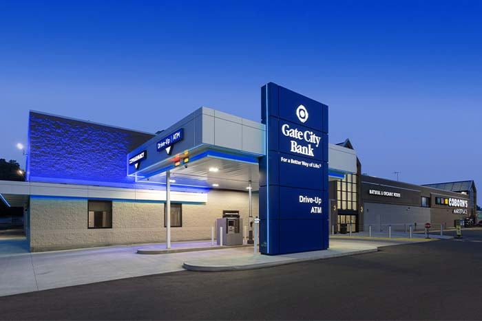 Evening view of Gate City Bank of Elk River’s drive-up entrance