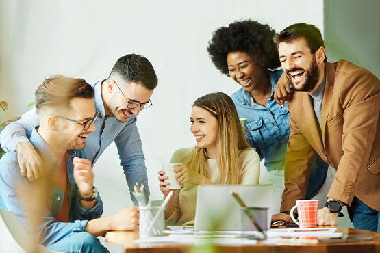 group of employees collaborate after boss obtained business line of credit to hire them