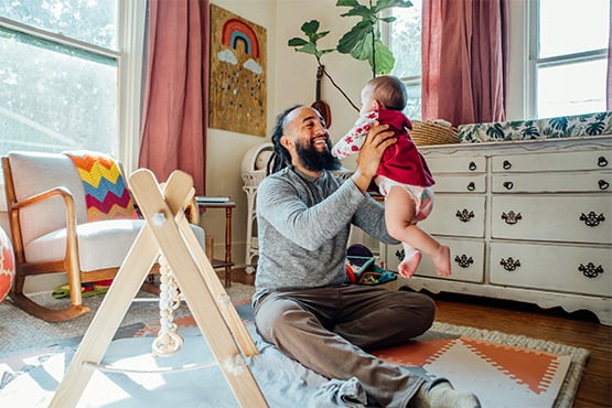 young father and daughter enjoy time together after investing tax refund wisely