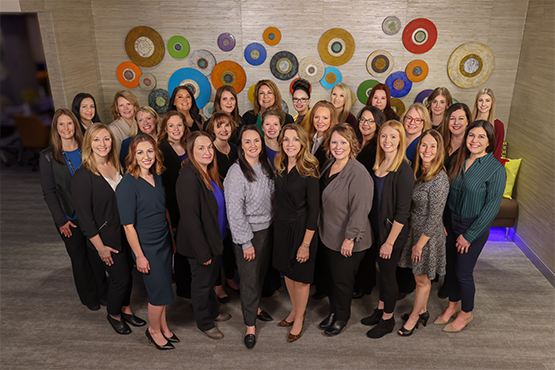 group of Gate City Bank women leaders poses for picture