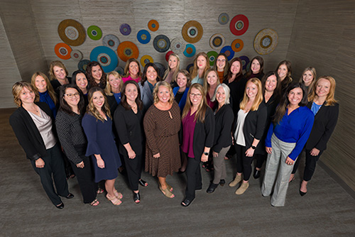 group of Gate City Bank women leaders poses for picture