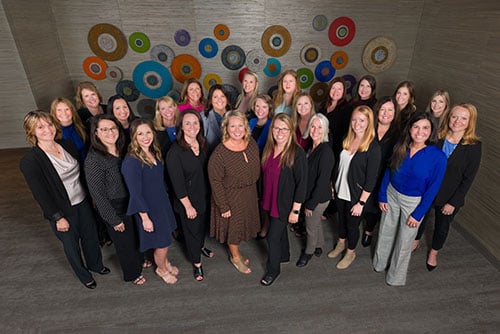 group of Gate City Bank women leaders poses for picture