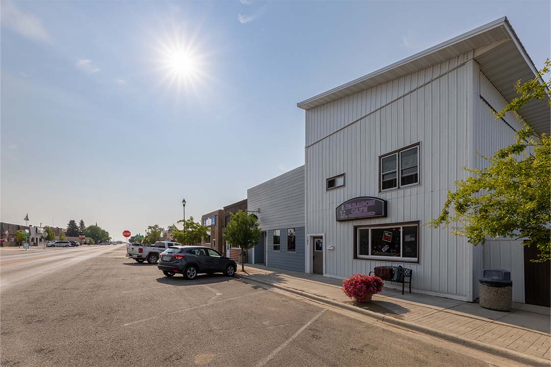 Main street view of downtown Mohall, North Dakota, featuring the Paragon Café