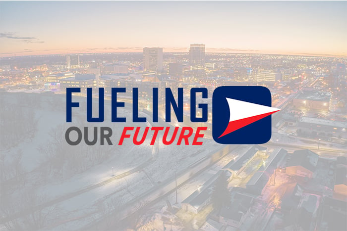 Fueling Our Future logo with future italicized and arrow pointing onward