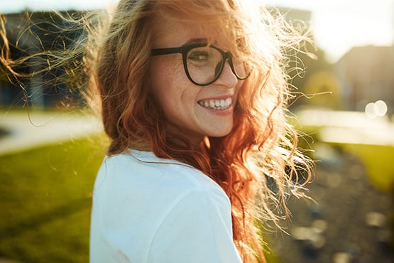 Young lady at a park in North Dakota after stopping at her local Gate City Bank to learn about mutual banking.