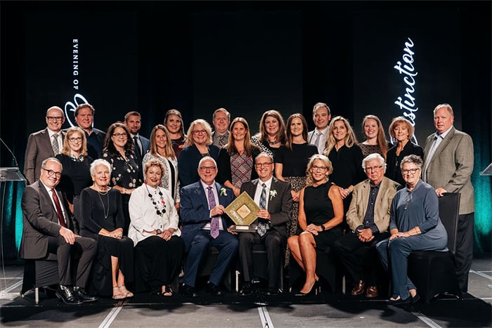 Gate City Bank team members and board of directors pose with award at the NDSU Evening of Distinction event