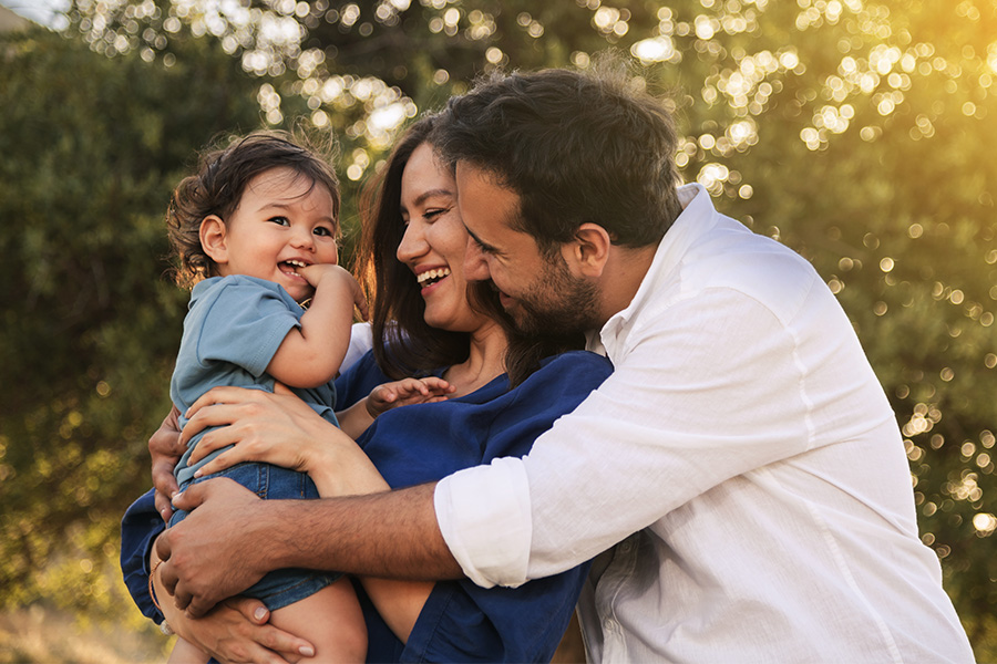 Young family in Minnesota at local park after visiting Gate City Bank to learn about the mutual banking benefits.