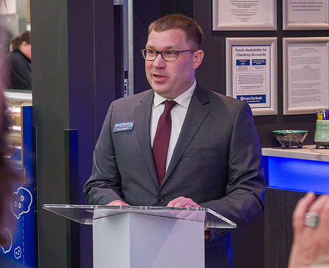 Marcus Boykin, VP, Retail Manager & Business Lender, speaks during Gate City Bank’s Williston Cash Wise Foods ribbon-cutting