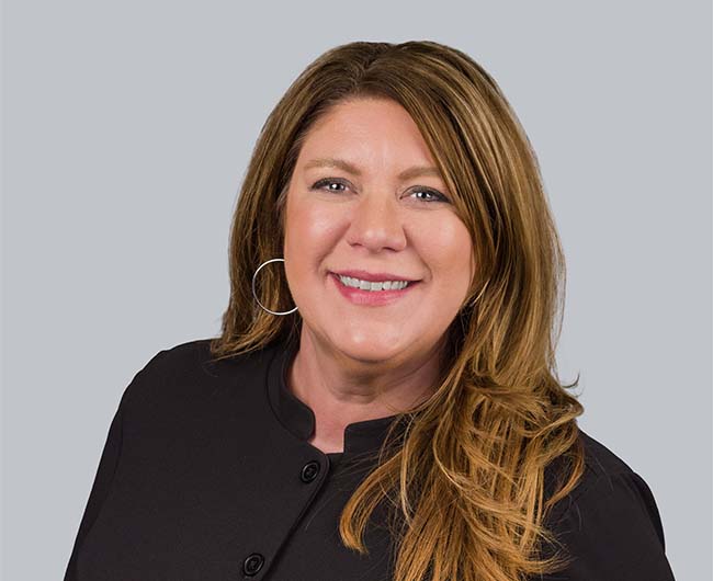 Professional headshot of Kim Settel, Executive Vice President of Retail Banking & Lending at Gate City Bank