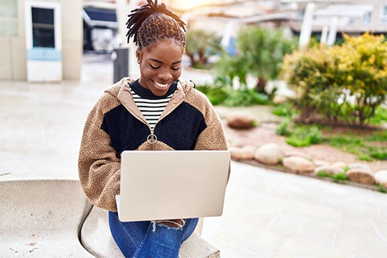 delighted customer helps herself with question by visiting FAQ page