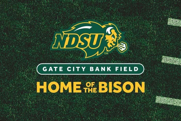 gate city bank field logo sits on a grassy textured background above the words home of the bison