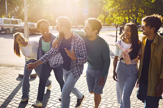 happy group of young people spend time together after improving their credit scores 
