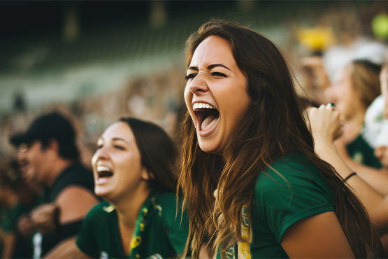 NDSU Bison fans cheering in Fargo, ND, near the Gate City Bank Fan Corner at the Fargodome